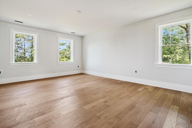 108 S St, Reading, MA 01867 - empty room with light wood-type flooring and baseboards