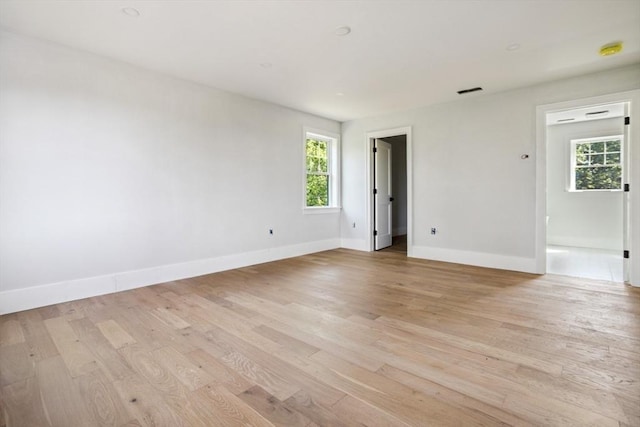 108 S St, Reading, MA 01867 - empty room featuring light wood-style flooring and a smoke detector