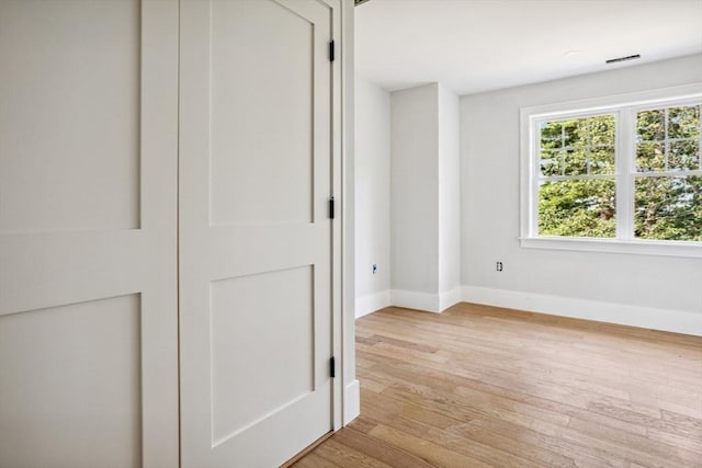 108 S St, Reading, MA 01867 - spare room featuring baseboards and light wood-type flooring