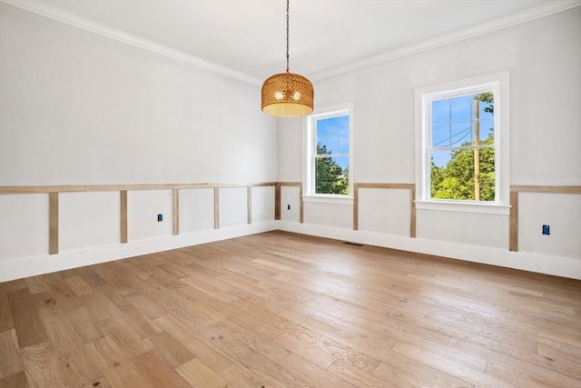 108 S St, Reading, MA 01867 - empty room with ornamental molding and light wood-type flooring