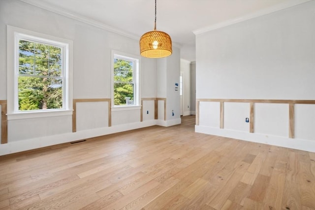 108 S St, Reading, MA 01867 - spare room featuring wood finished floors and ornamental molding