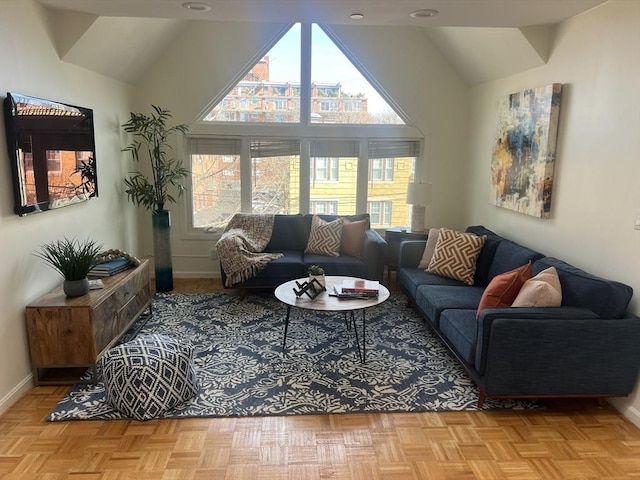 121 Longwood Ave Unit 4B, Brookline, MA 02446 - living area featuring vaulted ceiling and baseboards