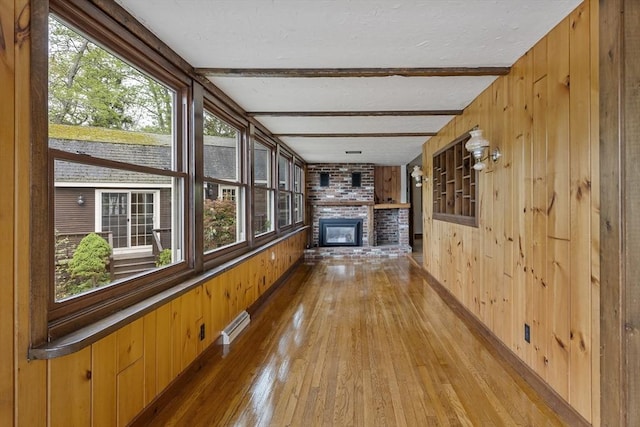 38 Lakeshore Dr, Wayland, MA 01778 - unfurnished sunroom with beamed ceiling and baseboard heating