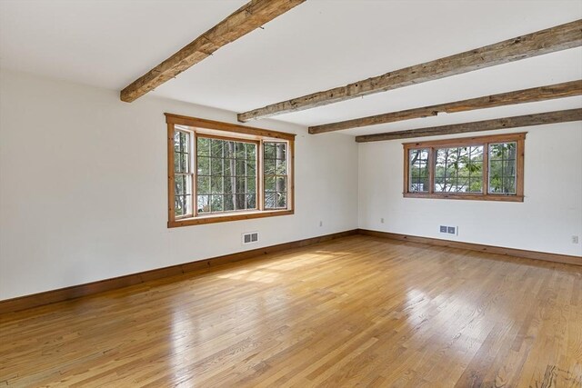 38 Lakeshore Dr, Wayland, MA 01778 - spare room with baseboards, light wood-style flooring, and beam ceiling