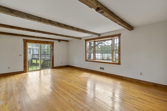 38 Lakeshore Dr, Wayland, MA 01778 - spare room with light wood-type flooring, baseboards, and beamed ceiling