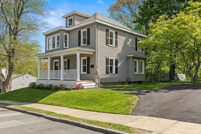 59 Altamont St, Haverhill, MA 01830 - traditional style home with a porch and a front yard