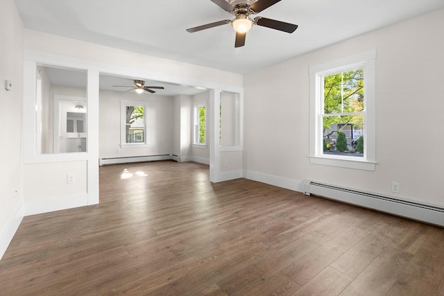 59 Altamont St, Haverhill, MA 01830 - empty room with a baseboard radiator, wood finished floors, plenty of natural light, and ceiling fan