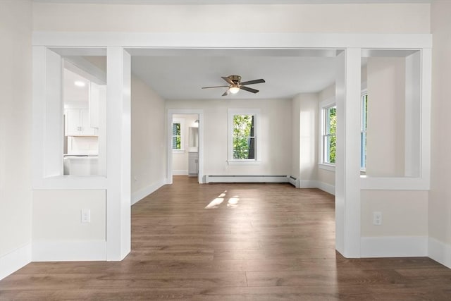 59 Altamont St, Haverhill, MA 01830 - unfurnished room with a baseboard radiator, ceiling fan, wood finished floors, and baseboards