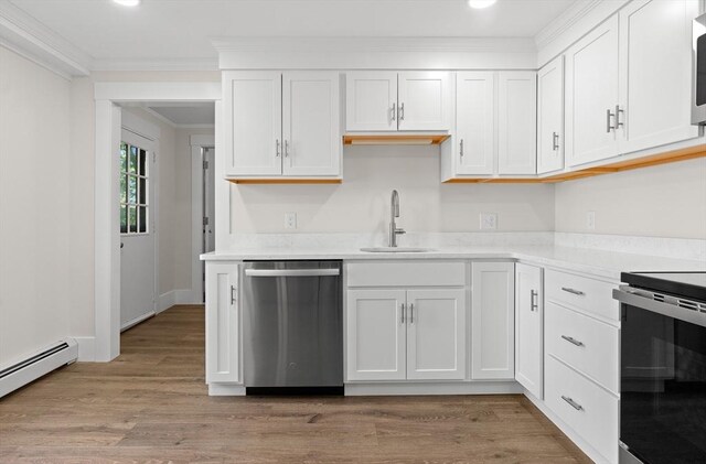 59 Altamont St, Haverhill, MA 01830 - kitchen with stainless steel dishwasher, a sink, range with electric stovetop, ornamental molding, and a baseboard radiator