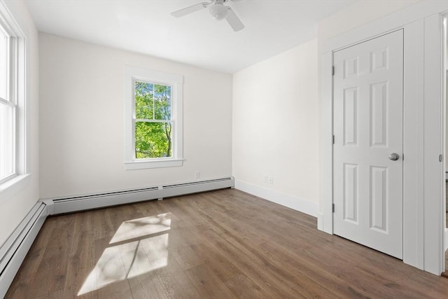 59 Altamont St, Haverhill, MA 01830 - unfurnished bedroom featuring wood finished floors, a baseboard heating unit, baseboards, and ceiling fan