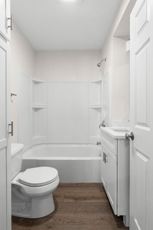 59 Altamont St, Haverhill, MA 01830 - full bath with toilet, washtub / shower combination, vanity, and wood finished floors