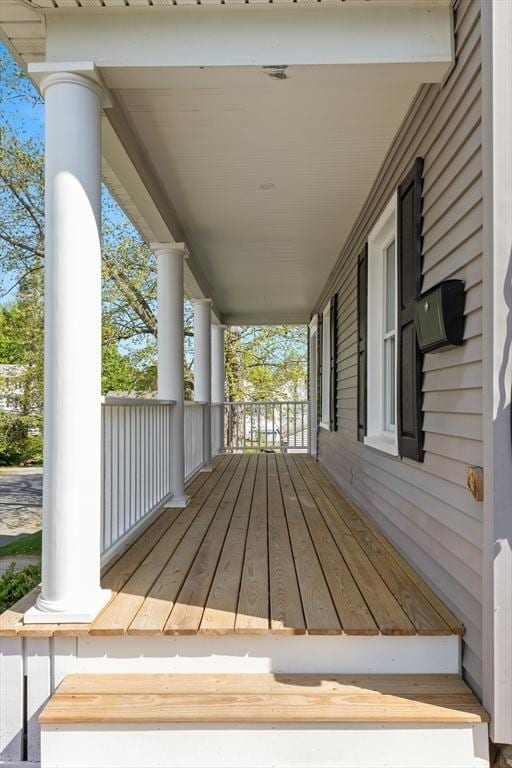 59 Altamont St, Haverhill, MA 01830 - wooden terrace featuring covered porch