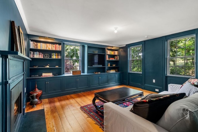 living room featuring visible vents and light wood-style flooring