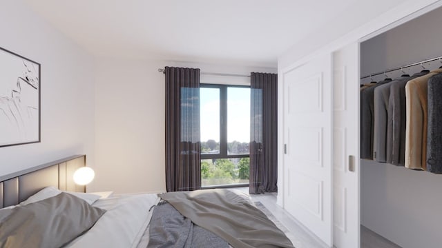 bedroom featuring light carpet and a closet