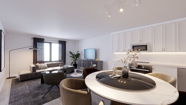 dining area with hardwood / wood-style flooring