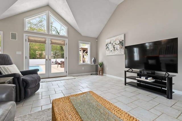 2 Cider Mill Rd, Peabody, MA 01960 - living room featuring vaulted ceiling, french doors, and baseboards