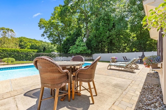 2 Cider Mill Rd, Peabody, MA 01960 - view of pool featuring a patio area, a fenced backyard, and outdoor dining area