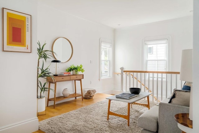 23 Hall Ave Unit 1, Somerville, MA 02144 - sitting room featuring wood finished floors, ornamental molding, and baseboards