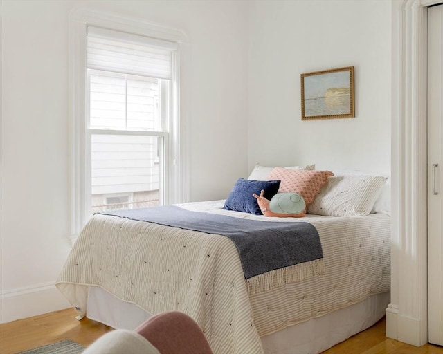 23 Hall Ave Unit 1, Somerville, MA 02144 - bedroom featuring wood finished floors and baseboards