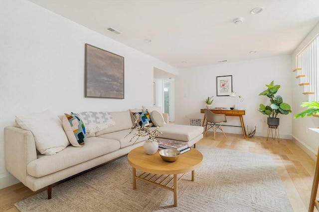 23 Hall Ave Unit 1, Somerville, MA 02144 - living room featuring light wood-style flooring and an office area