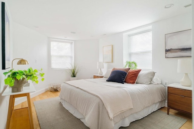 23 Hall Ave Unit 1, Somerville, MA 02144 - bedroom with light wood-type flooring and recessed lighting