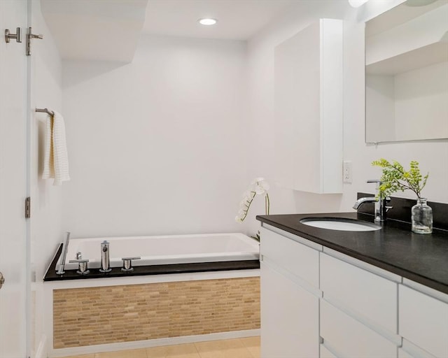 23 Hall Ave Unit 1, Somerville, MA 02144 - full bathroom featuring vanity, a garden tub, recessed lighting, and tile patterned floors