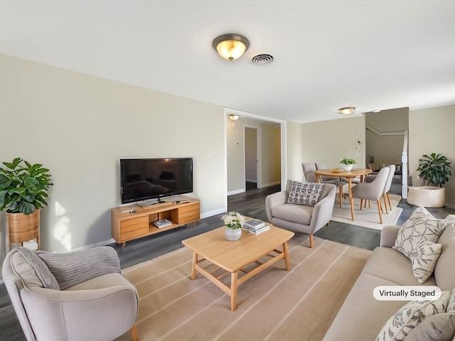 living room with wood-type flooring