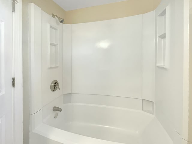 bathroom with shower / bath combination