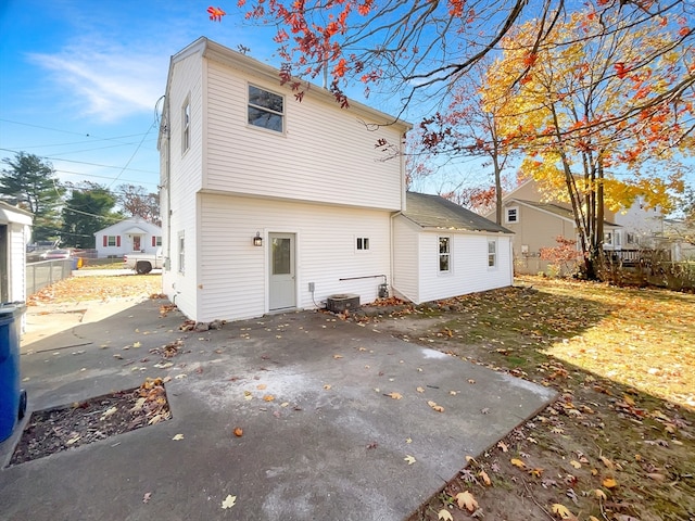 back of property featuring a patio area