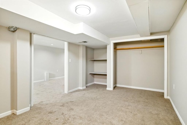 unfurnished bedroom with baseboards, visible vents, and carpet flooring