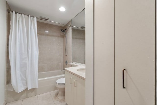 full bathroom with vanity, shower / bath combination with curtain, tile floors, and toilet