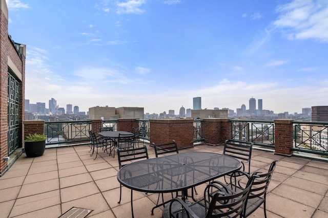 view of patio / terrace with a balcony