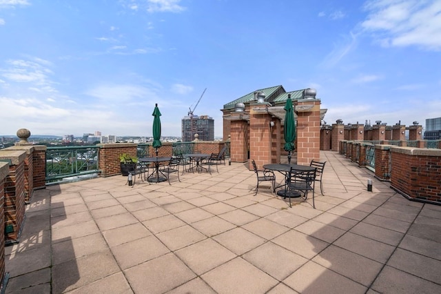 view of patio / terrace with a balcony