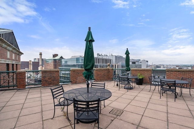 view of patio / terrace with a balcony