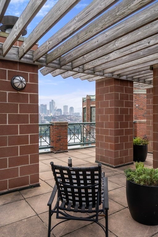 view of patio / terrace featuring a pergola