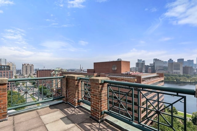 balcony featuring a water view