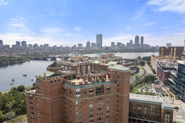 property's view of city featuring a water view