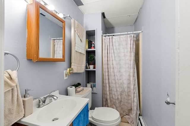 bathroom featuring curtained shower, baseboard heating, a sink, and toilet