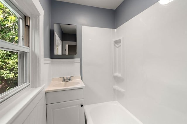 448 Washington St, Warren, MA 01083 - full bath featuring vanity, shower / bath combination, and a wainscoted wall
