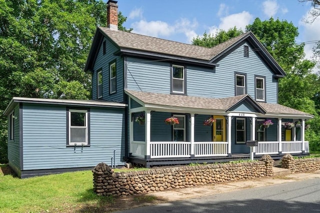448 Washington St, Warren, MA 01083 - view of front of house with covered porch, roof with shingles, and a chimney