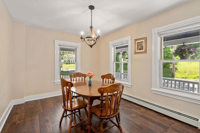448 Washington St, Warren, MA 01083 - dining space featuring a baseboard radiator, a chandelier, and dark wood-style floors