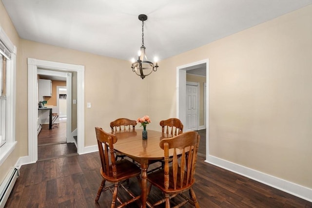 448 Washington St, Warren, MA 01083 - dining room featuring baseboard heating, a chandelier, and dark wood-type flooring