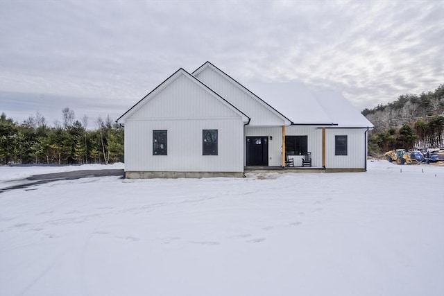 view of snow covered property