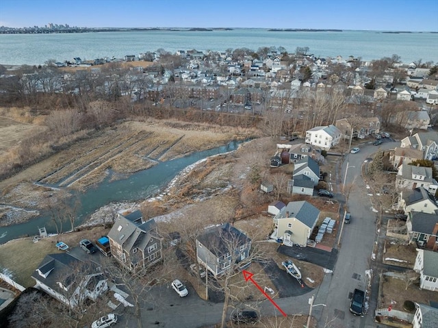 drone / aerial view with a water view