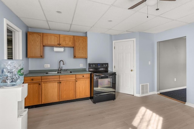 37 Thurston Ave Unit 37, Northbridge, MA 01588 - kitchen featuring electric range, a sink, a paneled ceiling, a ceiling fan, and light wood finished floors