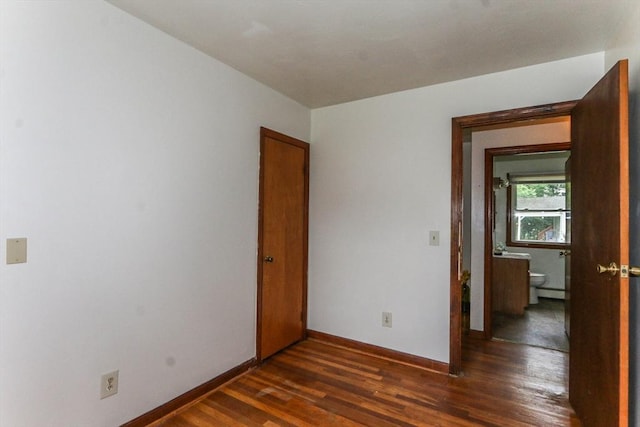 109 Bacon Rd, Springfield, MA 01119 - empty room featuring dark wood-type flooring and baseboards