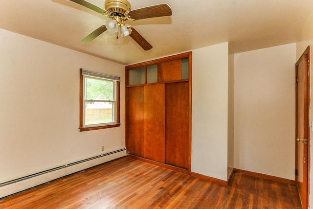 109 Bacon Rd, Springfield, MA 01119 - unfurnished bedroom featuring a baseboard heating unit, wood finished floors, a closet, and ceiling fan