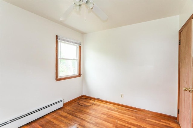 109 Bacon Rd, Springfield, MA 01119 - empty room with a baseboard radiator, ceiling fan, and wood finished floors