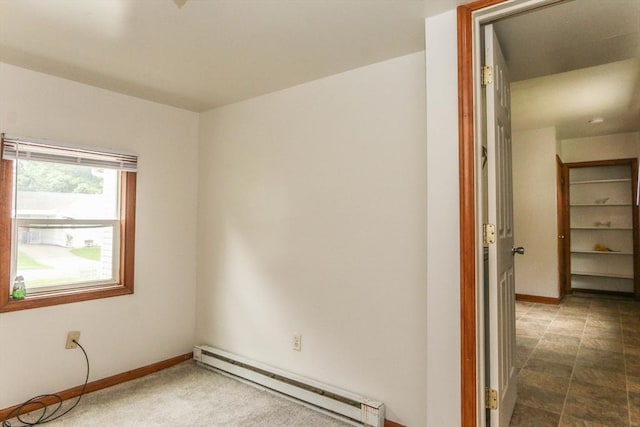 109 Bacon Rd, Springfield, MA 01119 - spare room featuring a baseboard heating unit and baseboards