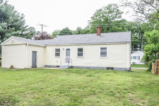 109 Bacon Rd, Springfield, MA 01119 - rear view of house with a chimney, roof with shingles, a yard, and entry steps